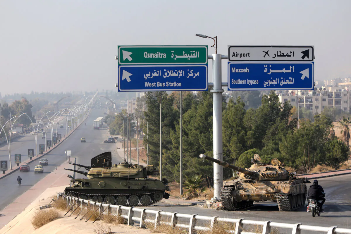 Tanks abandoned by the Syrian army are pictured outside Damascus, Syria, on Dec. 9, 2024. (Bakr Alkasem/ AFP)