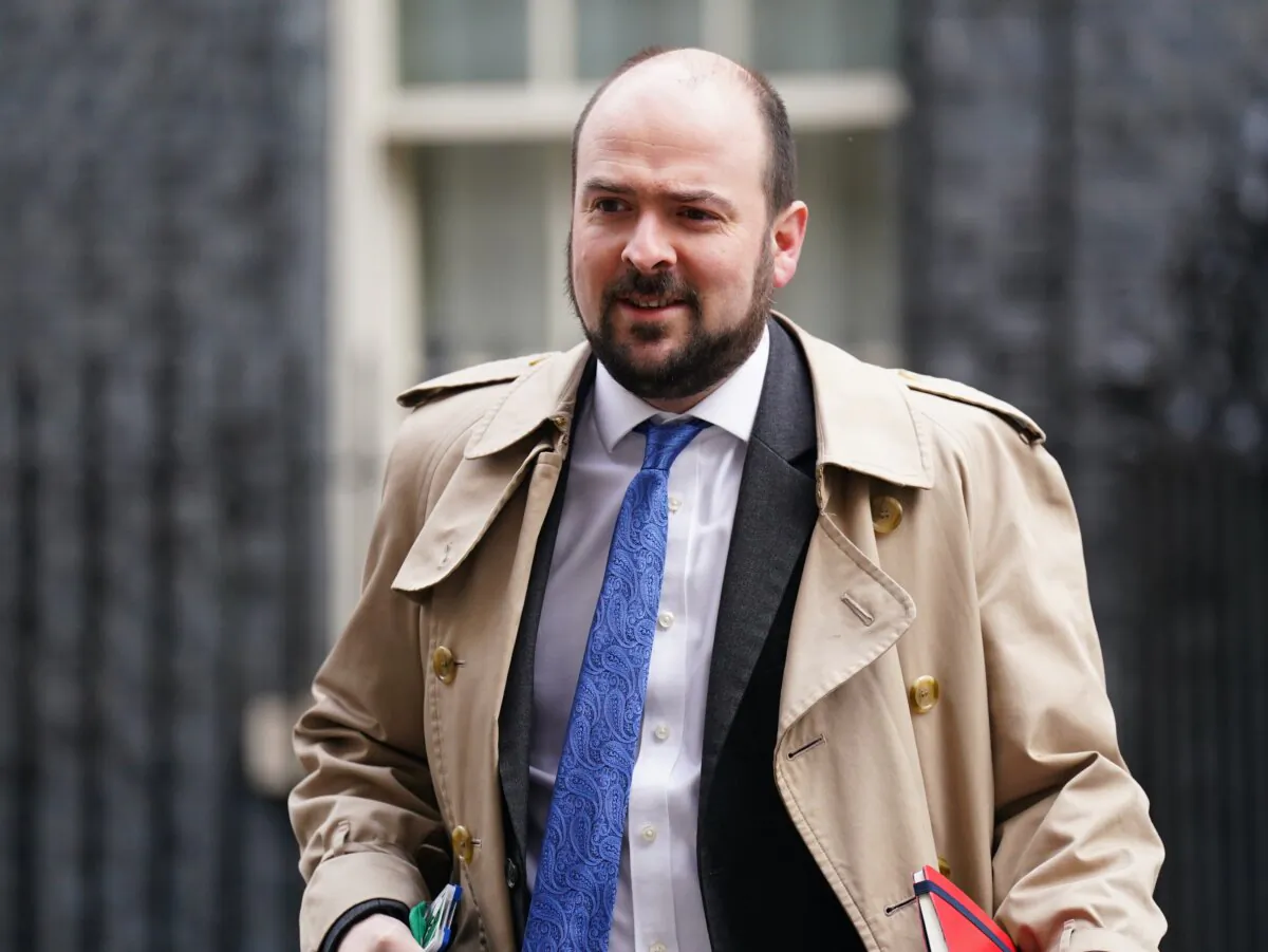 Conservative MP Richard Holden walks along Downing Street in London in an undated file photo. (James Manning/PA)