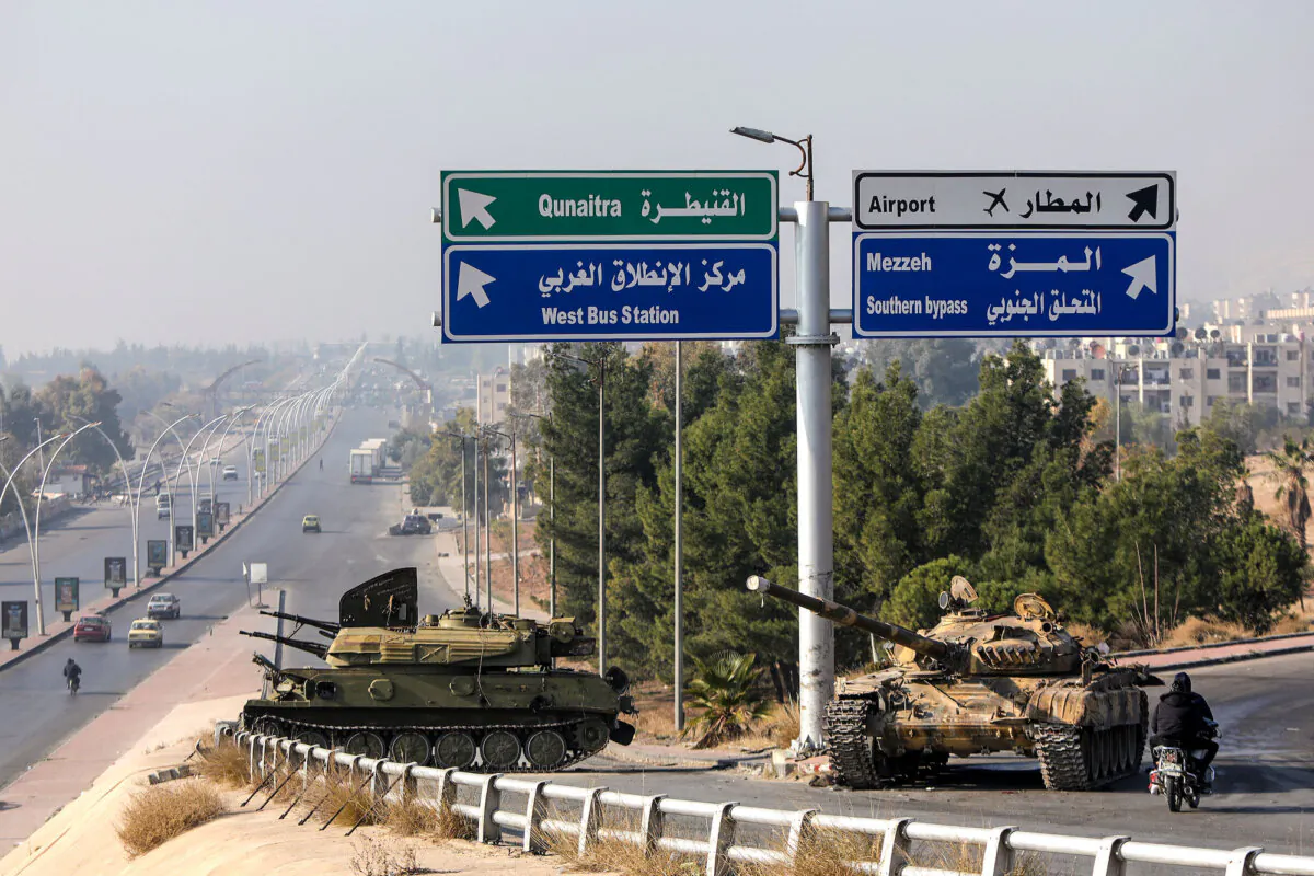 Military tanks abandoned by the Syrian army are pictured outside Damascus, on Dec. 9, 2024. (Bakr Alkasem/ AFP via Getty Images)