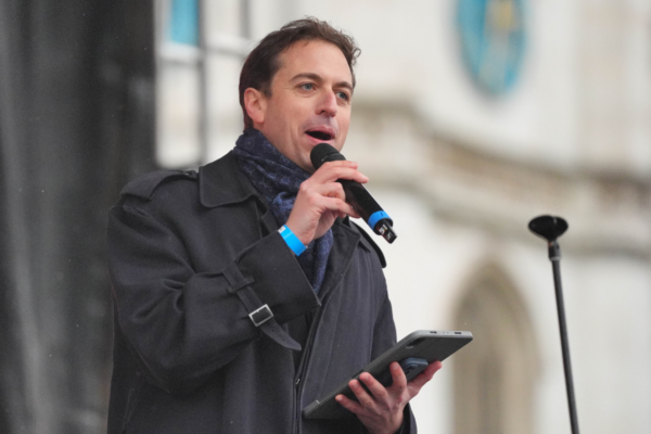 Chief Executive of Campaign Against Antisemitism Gideon Falter speaking at a rally in Parliament Square during a march and rally in central London, England, on Dec. 8, 2024. (Jonathan Brady/PA Wire)