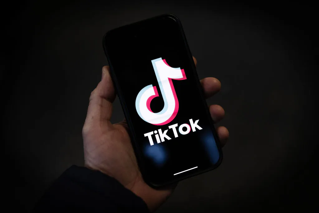 In this photo illustration, a TikTok logo is displayed on an iPhone in London on Feb. 28, 2023. (Dan Kitwood/Getty Images)