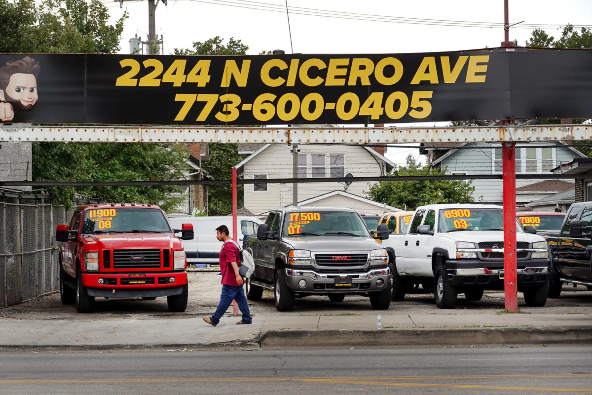 Used cars are offered for sale at a dealership in Chicago on July 11, 2023. (Scott Olson/Getty Images)