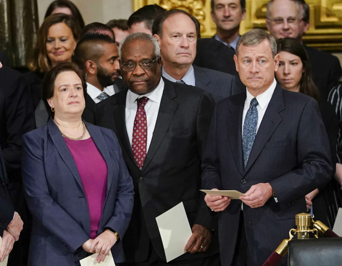 Supreme Court Associate Justices Elena Kagan (L), Clarence Thomas (2L), Samuel Alito (2R) and Chief Justice John Roberts (R) arrive for services for former President George H.W. Bush at the U.S. Capitol on Dec. 3, 2018. (Pablo Martinez Monsivais/AP Photo)