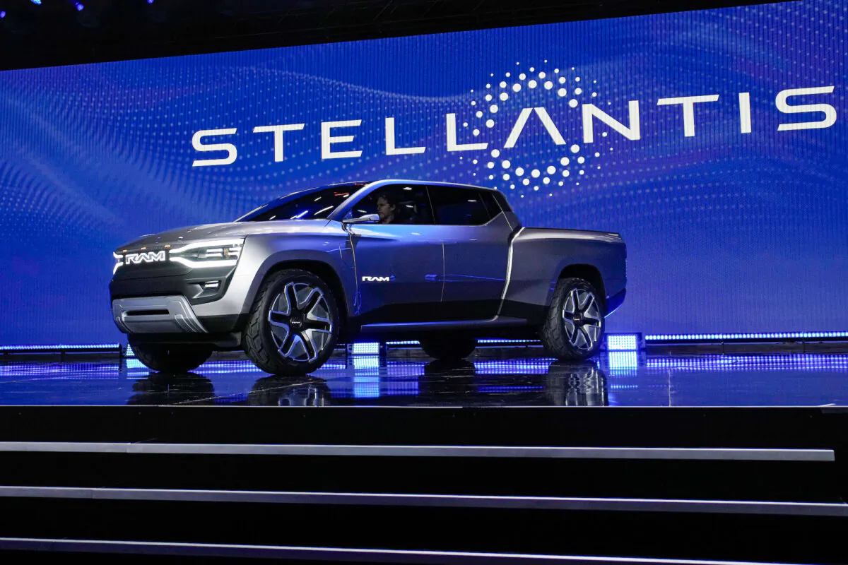 The Ram 1500 Revolution electric battery powered pickup truck is displayed onstage during an event in Las Vegas on Jan. 5, 2023. (John Locher/AP Photo)