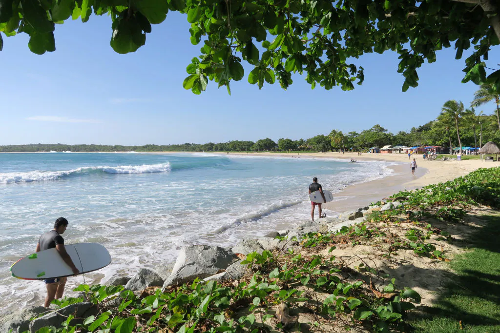 A general view of surfers at Natadola Beach in Viti Levu, Fiji, on Oct. 10, 2023. (Fiona Goodall/Getty Images)