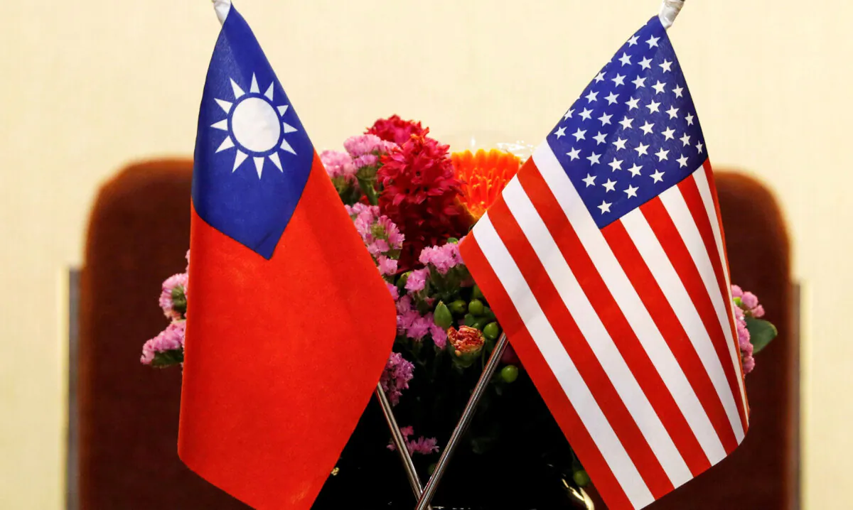 Flags of Taiwan and U.S. are placed for a meeting in Taipei, Taiwan, on March 27, 2018. (Tyrone Siu/Reuters)
