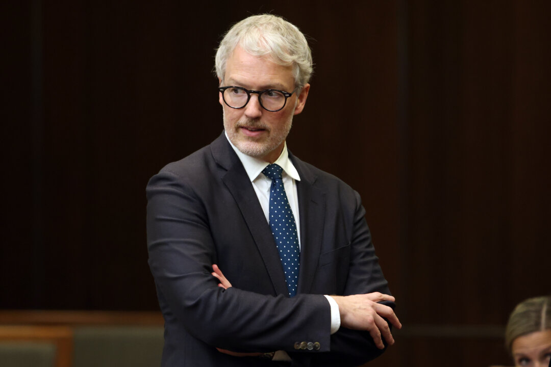 MPs Probe NATO Suspect’s Screening as Privacy Commissioner Says Past Fraud Finding Could’ve Been Shared