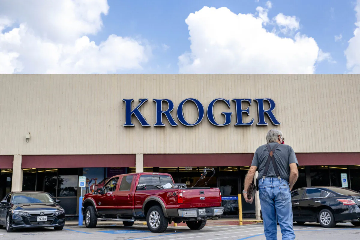 A customer walks into a Kroger grocery store in Houston on Sept. 9, 2022. (Brandon Bell/Getty Images)