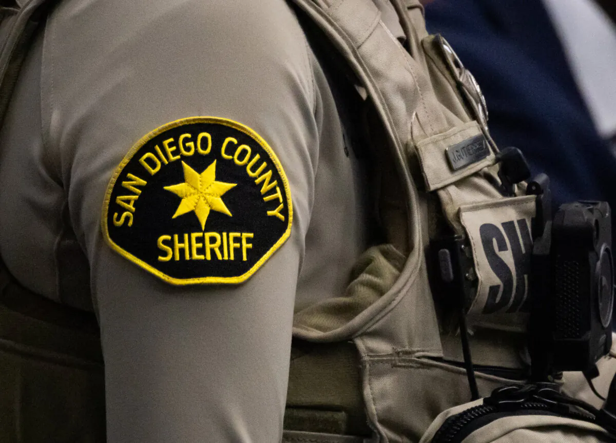 A San Diego County Sheriffs Department deputy stands guard in San Diego, Calif., on Dec. 10, 2024. (John Fredricks/The Epoch Times)