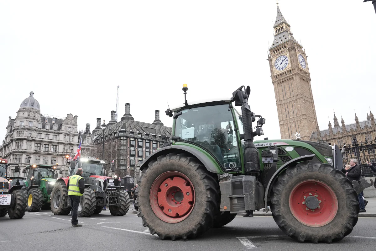 Tractors are lined up outside the Houses of Parliament during a protest by farmers over the changes to inheritance tax rules in the recent budget,  in Westminster, London, on Dec. 11, 2024. (Stefan Rousseau/PA Wire)