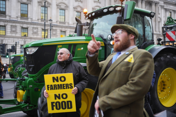 Tractors are parked on Whitehall in Westminster in protest by farmers over the changes to inheritance tax rules in London, England, on Dec. 11, 2024. (Yui Mok/PA Wire)