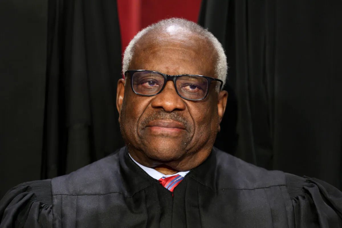 Supreme Court Associate Justice Clarence Thomas poses for an official portrait at the East Conference Room of the Supreme Court building in Washington on Oct. 7, 2022. (Alex Wong/Getty Images)