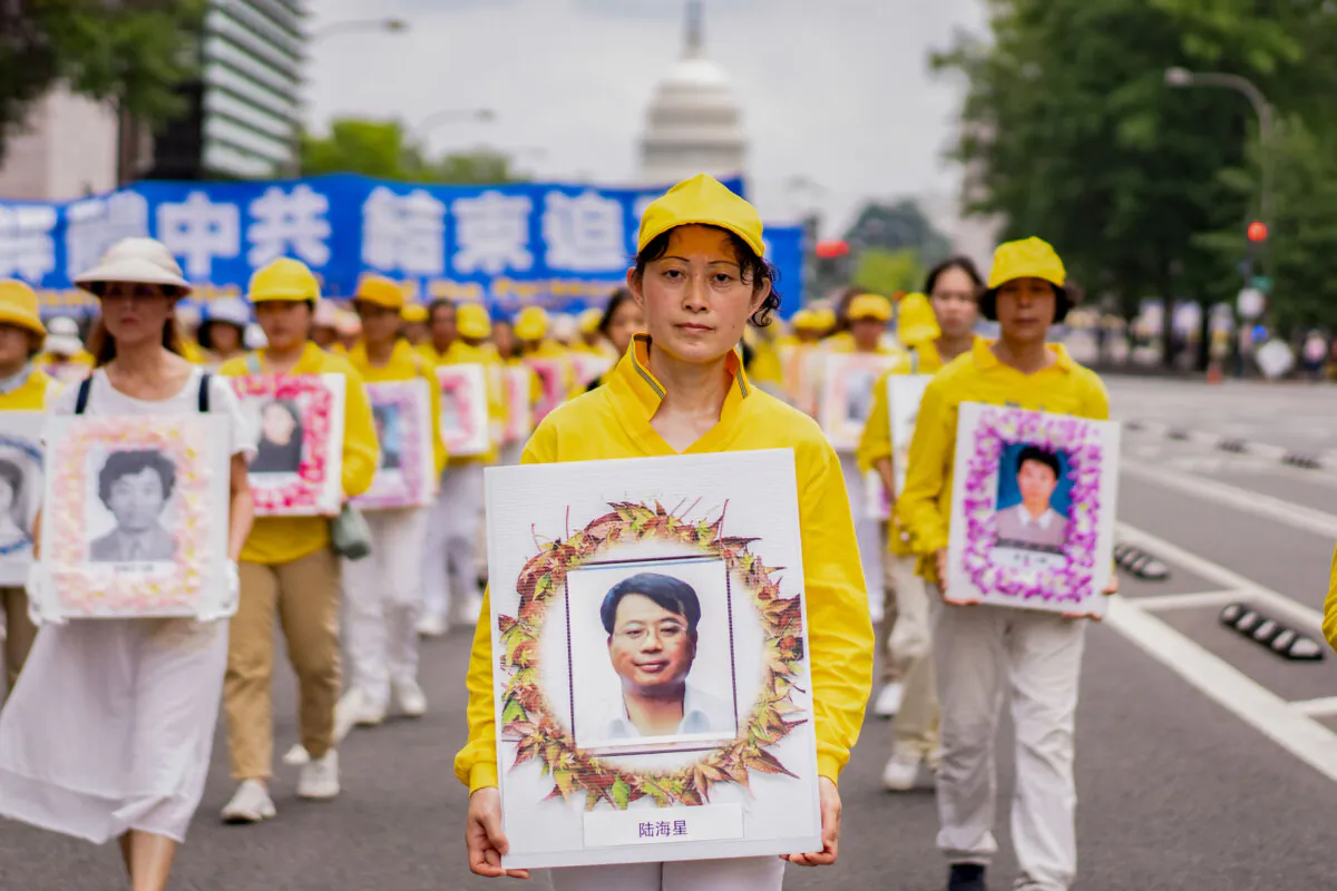 Falun Gong practitioners take part in a parade to mark the 24th anniversary of the persecution of the spiritual discipline in China by the Chinese Communist Party, in Washington on July 20, 2023. (Samira Bouaou/The Epoch Times)