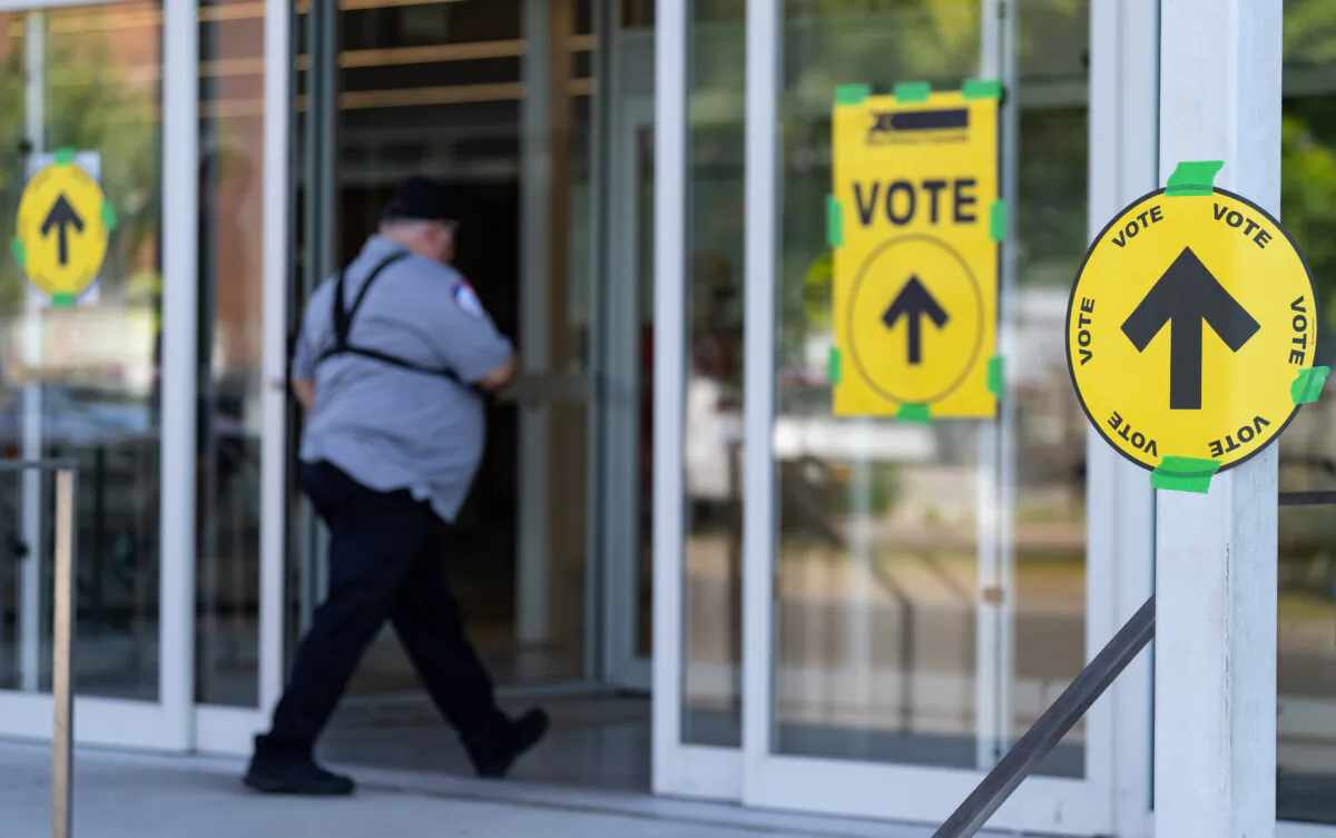 Voters arrive to cast their ballots in the federal byelection for the riding of Lasalle-Emard-Verdun in Montreal on Sept. 16, 2024. (The Canadian PressT/Christinne Muschi)