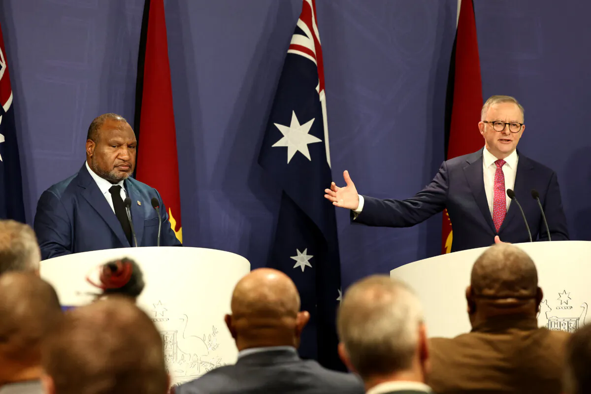 Australian Prime Minister Anthony Albanese (R) speaks next to Papua New Guinea's Prime Minister James Marape during a press conference in Sydney, Australia on Dec. 12, 2024.  (David Gray/AFP via Getty Images)