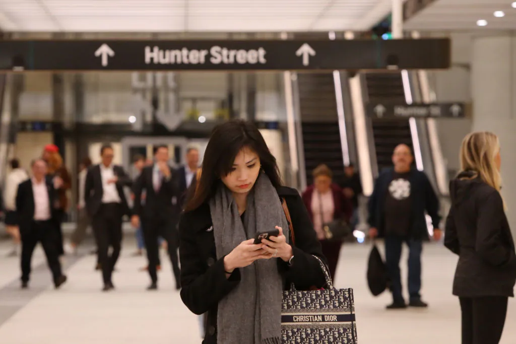Commuters make their way through Martin Place Metro Station in Sydney, Australia, on Aug. 19, 2024. (Lisa Maree Williams/Getty Images)
