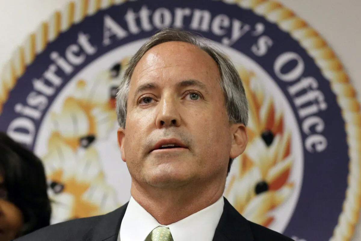 Texas Attorney General Ken Paxton speaks at a news conference in Dallas on June 22, 2017. (Tony Gutierrez/AP Photo)