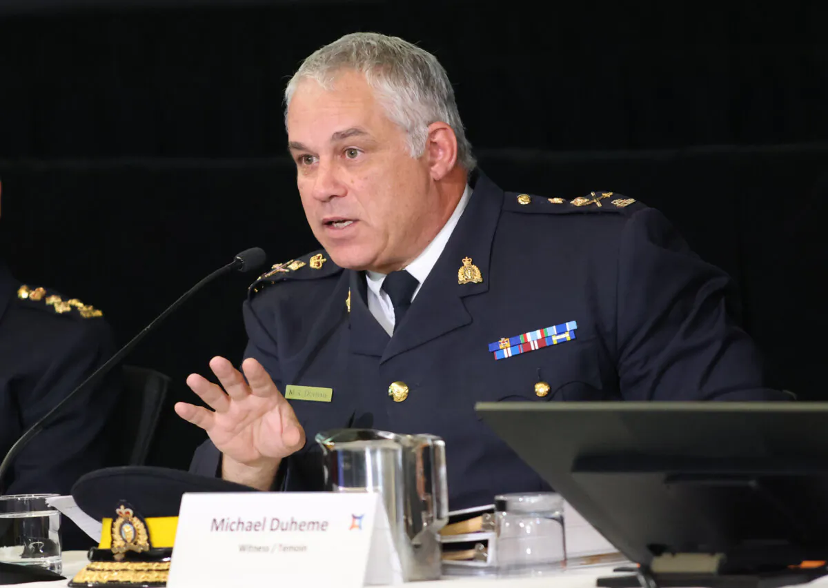 Royal Canadian Mounted Police (RCMP) commissioner Michael Duheme testifies at the Foreign Interference Commission in Ottawa on Oct. 3, 2024. (The Canadian Press/Patrick Doyle)