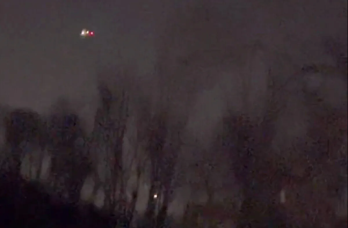 Several drones appear to be flying over Randolph, N.J., on Dec. 4, 2024, in a still from video. (MartyA45_ /TMX via AP)