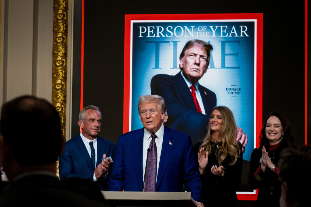 Day in Photos: ‘Person of the Year,’ Moment of Silence, and a Trip in a Blizzard