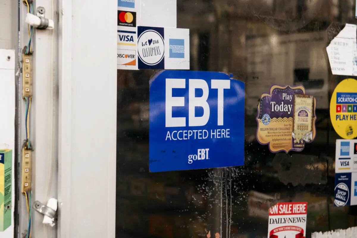 A sign alerting customers about SNAP food stamp benefits accessed via EBT (Electronic Benefit Transfer) cards at a Brooklyn grocery store in New York City on Dec. 5, 2019. (Scott Heins/Getty Images)