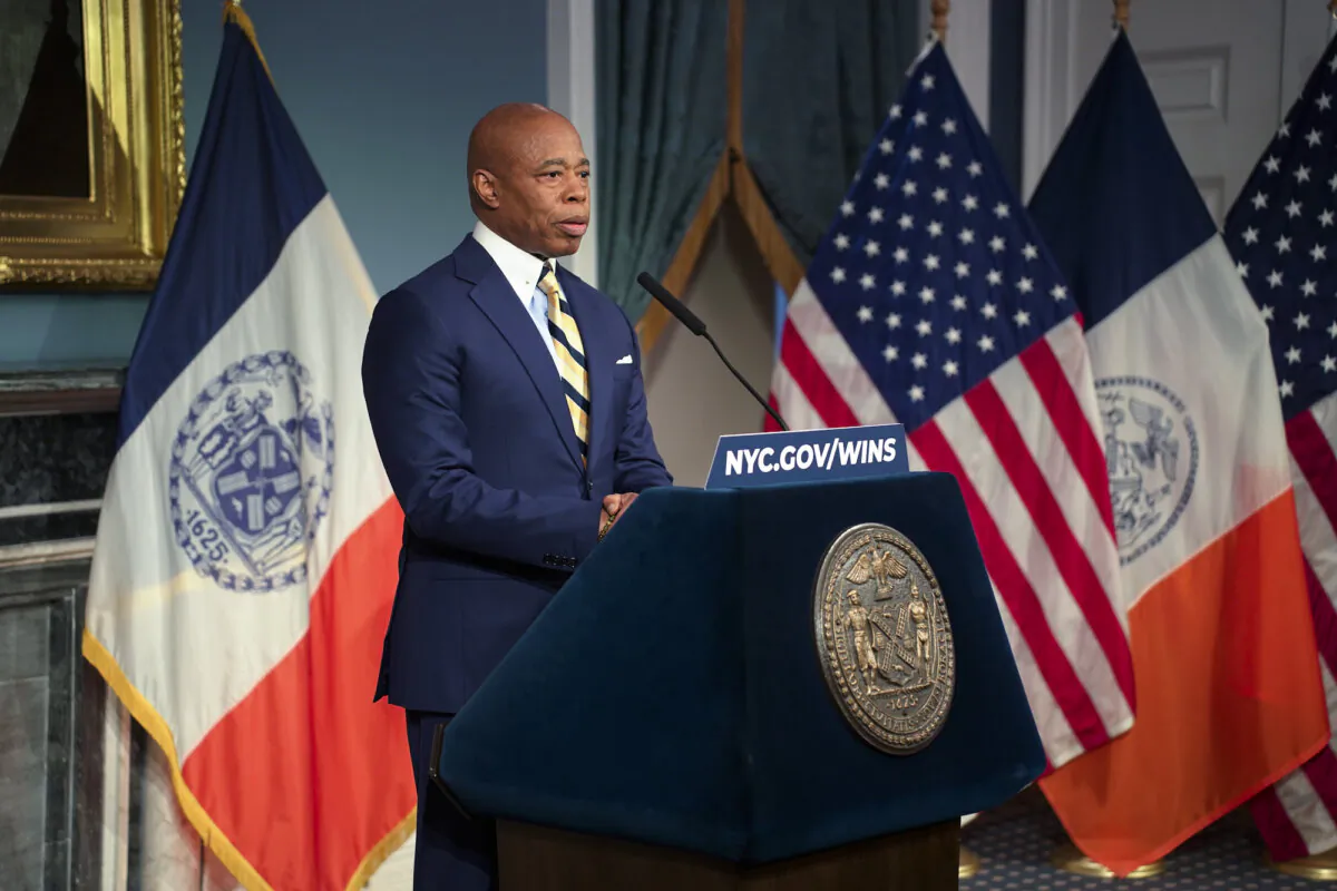 New York City Mayor Eric Adams speaks at a media availability event after his meeting with border czar Tom Homan in New York City, on Dec. 12, 2024. (Oliver Mantyk/The Epoch Times)
