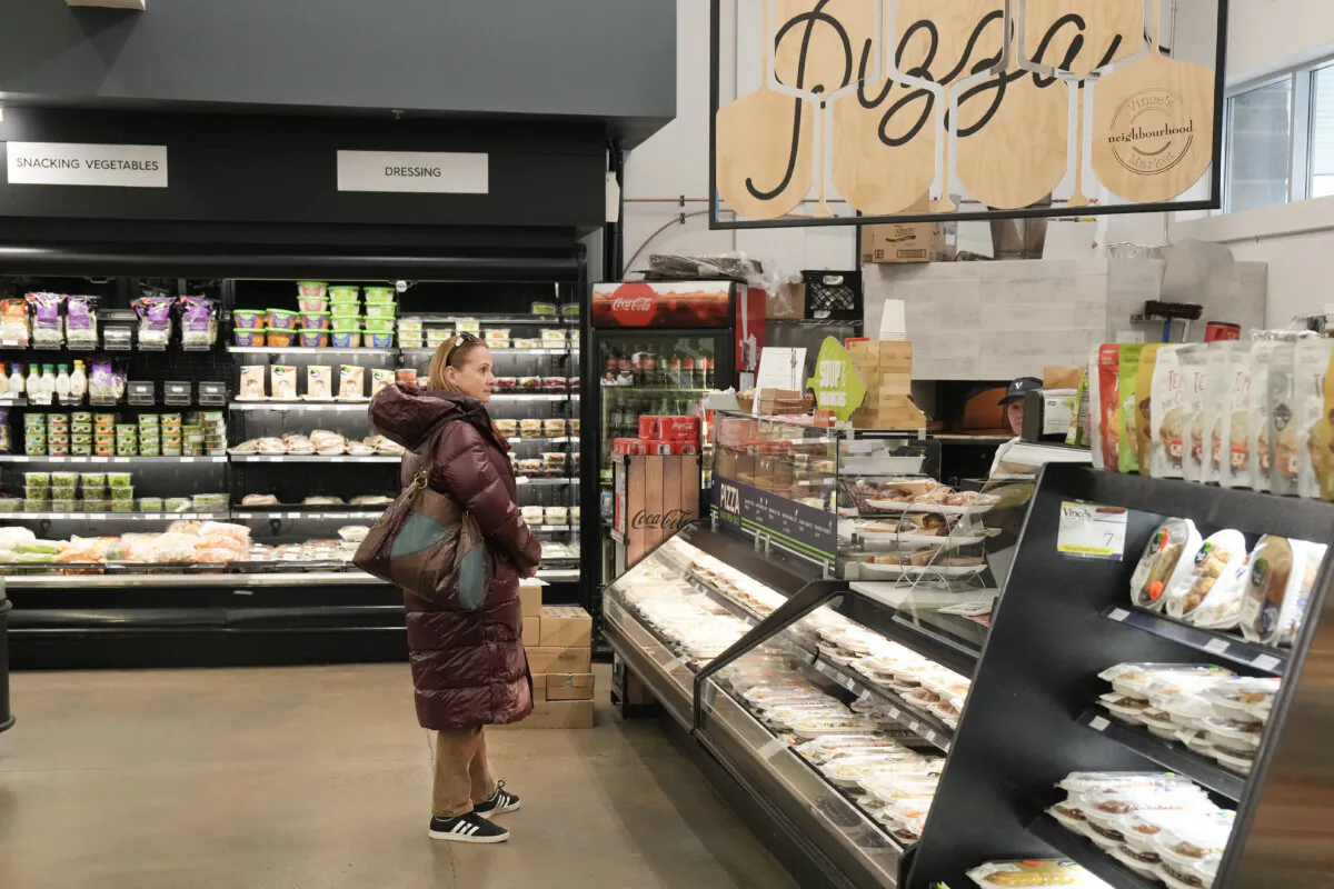 A customer shops at a grocery store in Sharon, Ontario, on Nov. 21, 2024. A government bill aimed at waiving GST/HST on essential goods such as groceries, children's clothing, Christmas trees, and restaurant meals between Dec. 14, 2024, and Feb. 15, 2025, passed the Senate on Thursday. (The Canadian Press/Chris Young)