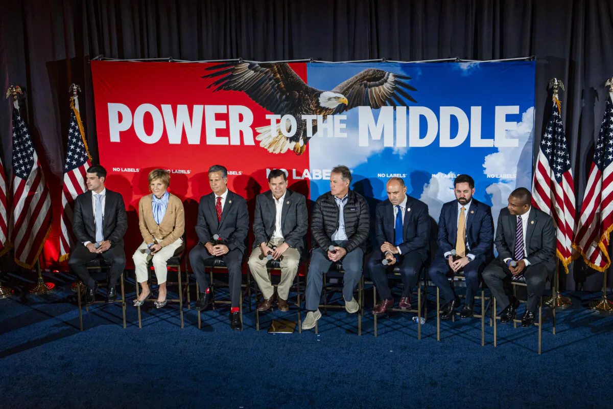Lawmakers speak during the No Labels Power to the Middle conference in Washington on Dec. 12. (Madalina Vasiliu/The Epoch Times)