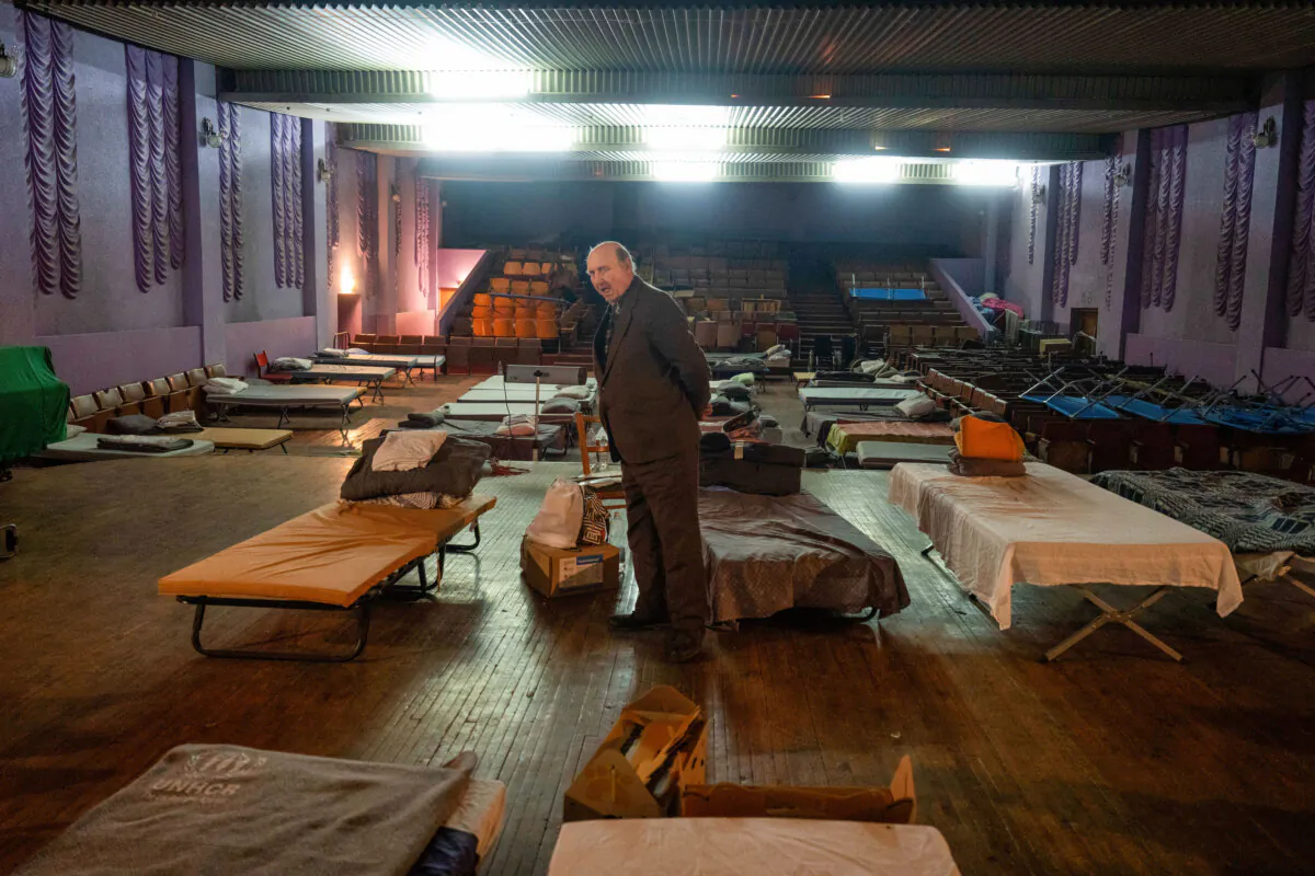 A man prepares to evacuate to western Ukraine in a theater in Pavlohrad, Dnipropetrovsk region, on Dec. 12, 2024. (Efrem Lukatsky/AP Photo)