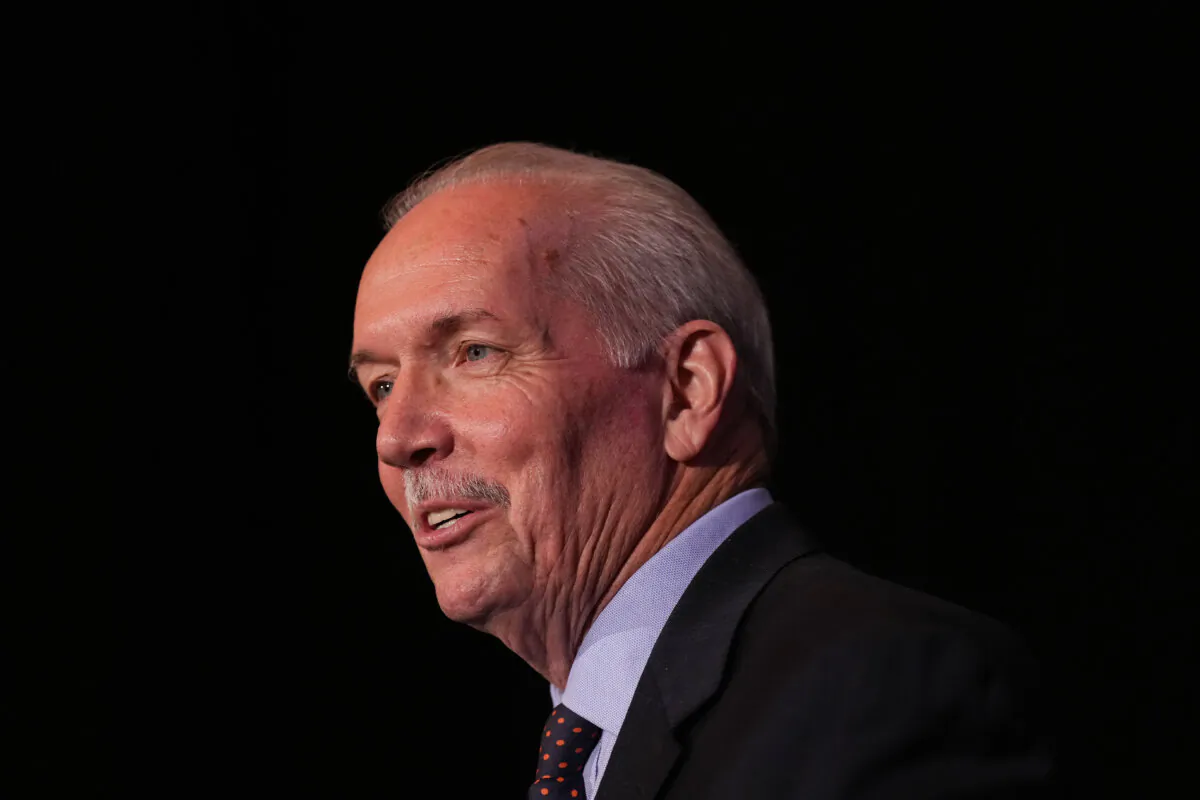 B.C. Premier John Horgan speaks during a question-and-answer session at a B.C. Chamber of Commerce luncheon on his last full day as premier of the province, in Vancouver, on Nov. 17, 2022. (The Canadian Press/Darryl Dyck) 