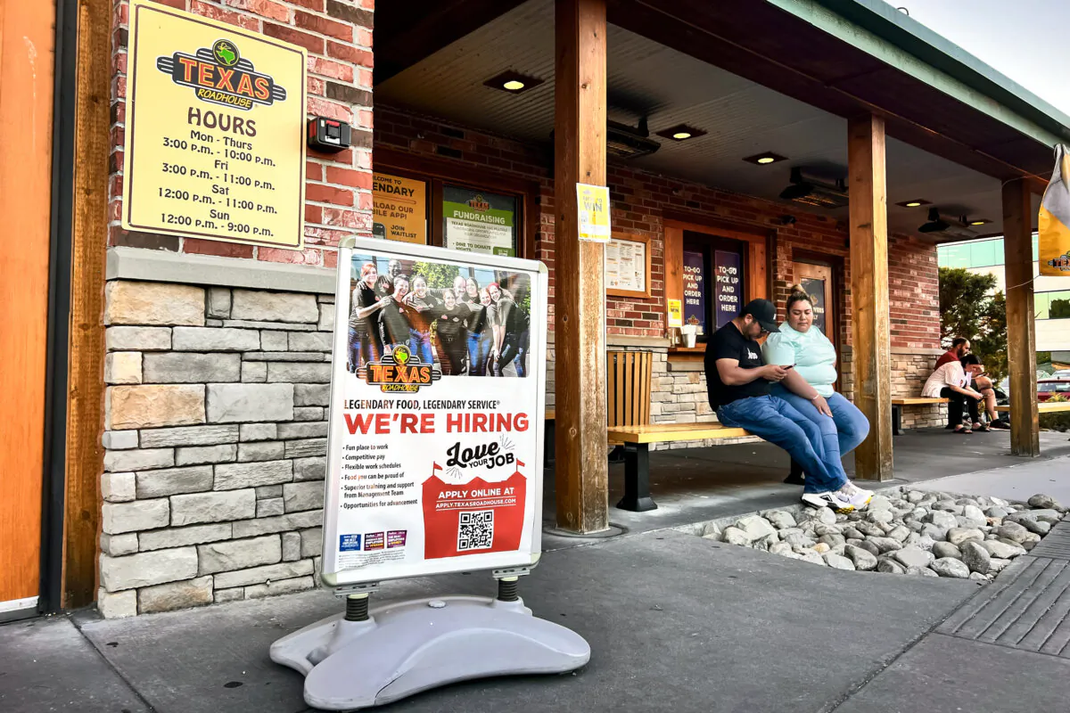 A hiring sign at a restaurant in Columbia, Md., on June 15, 2024. (Madalina Vasiliu/The Epoch Times)