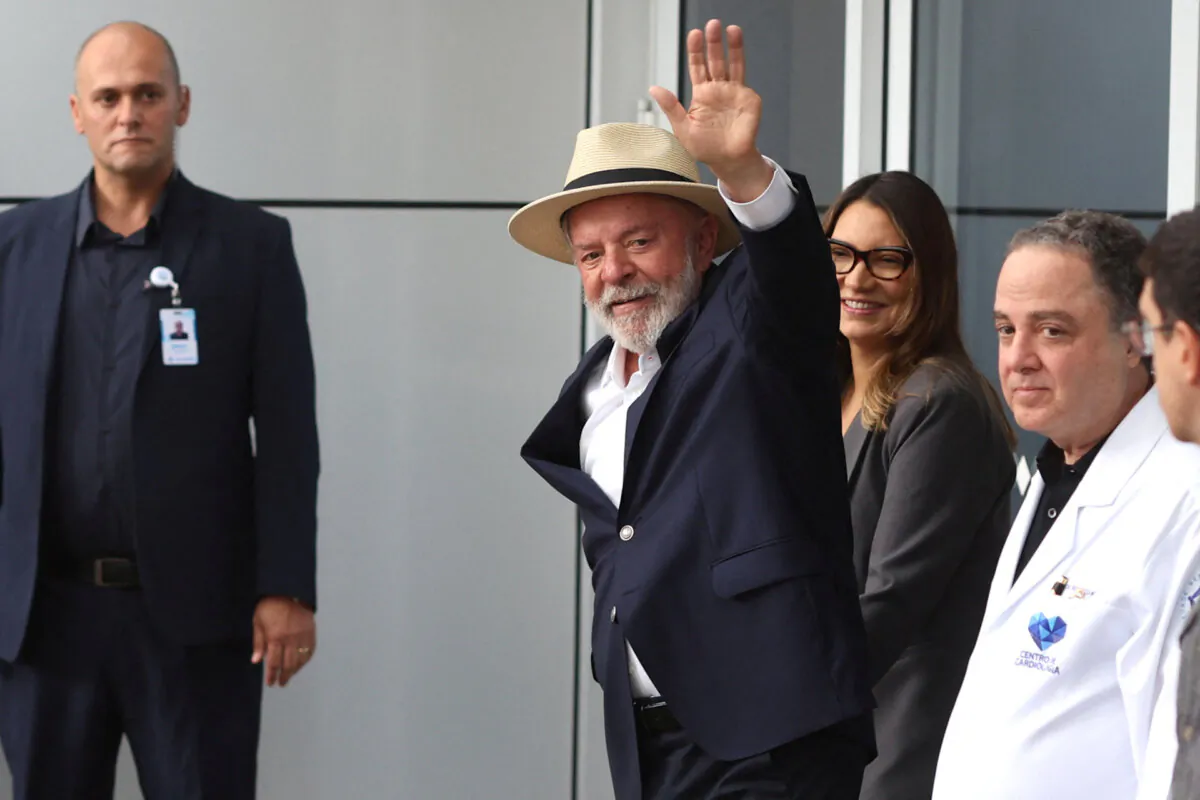 Brazilian President Luiz Inacio Lula da Silva waves while leaves the Sirio-Libanes Hospital after a surgery, in Sao Paulo, Brazil, on Dec. 15, 2024. (Felipe Iruata/Reuters)