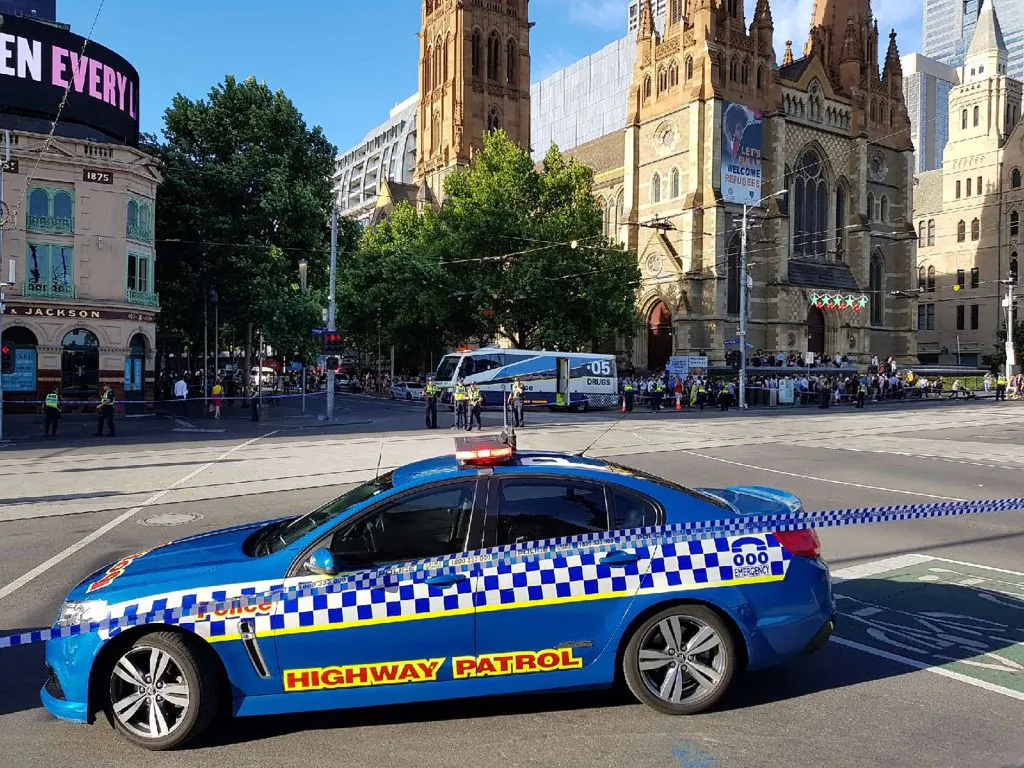 Police cordon off the area after a car hit pedestrians in the busy central business district of Melbourne, Australia, on Dec. 21, 2017. (MARK PETERSON/AFP via Getty Images)