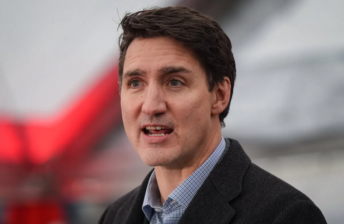 Prime Minister Justin Trudeau speaks during a launch and naming ceremony for the new Royal Canadian Navy Joint Support vessel HMCS Protecteur at Seaspan Shipyards in North Vancouver, B.C. on Dec. 13, 2024. (The Canadian Press/Darryl Dyck) 