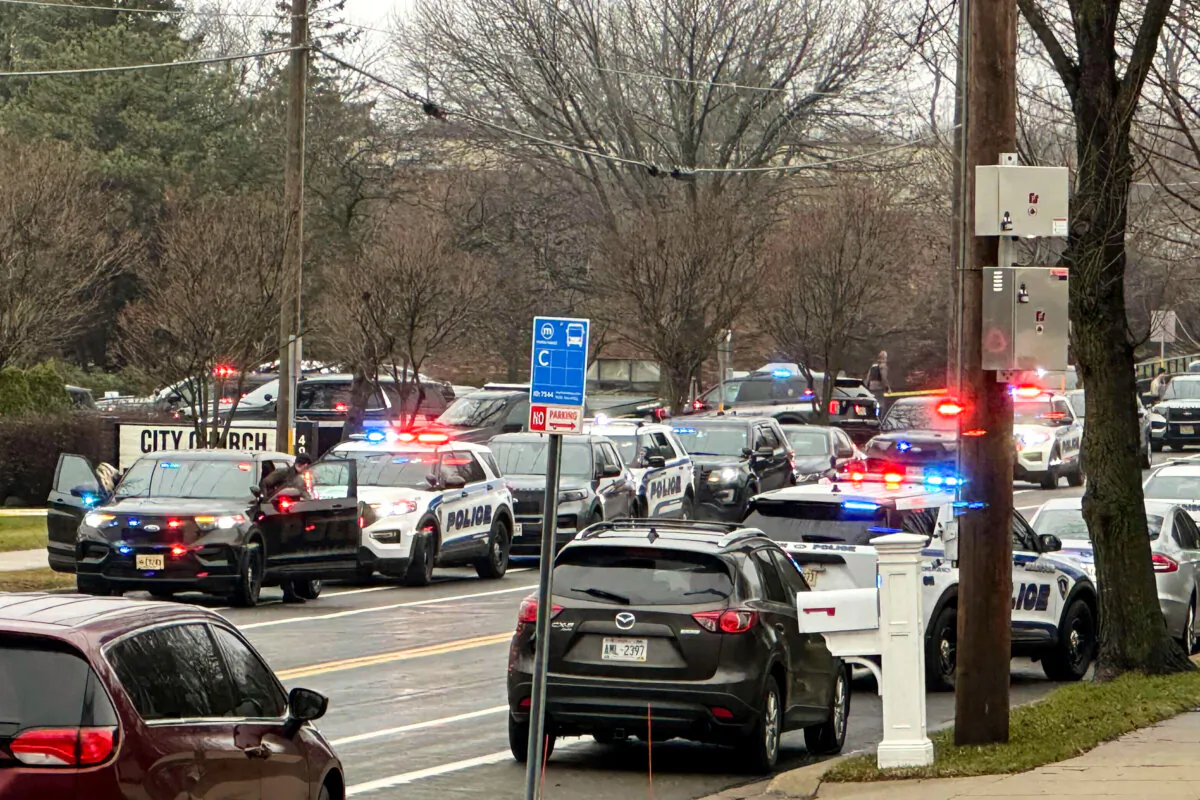 Emergency vehicles are parked outside the Abundant Life Christian School in Madison, Wis., following a shooting, on Dec. 16, 2024. (Scott Bauer/AP Photo)
