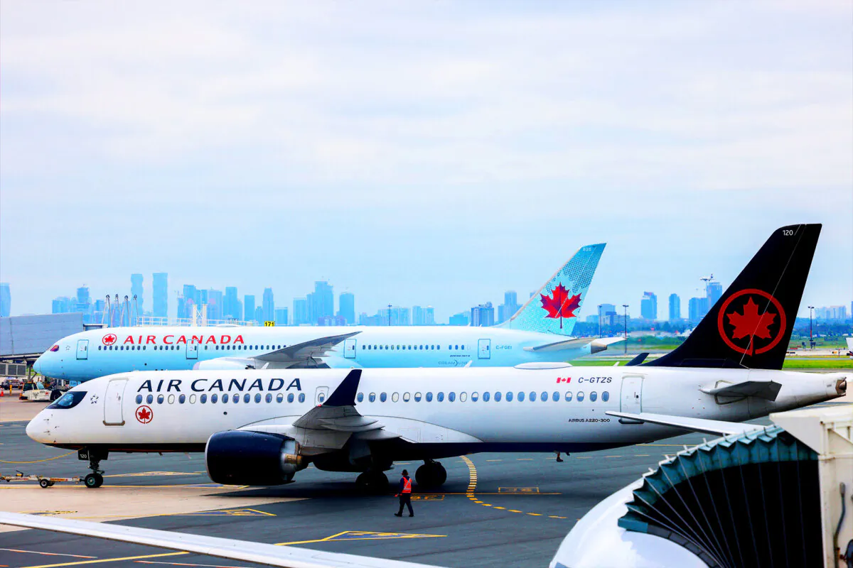 Air Canada aircraft are seen on the tarmac at the Toronto Pearson Airport on June 10, 2024. (Charly Triballeau/AFP via Getty Images)