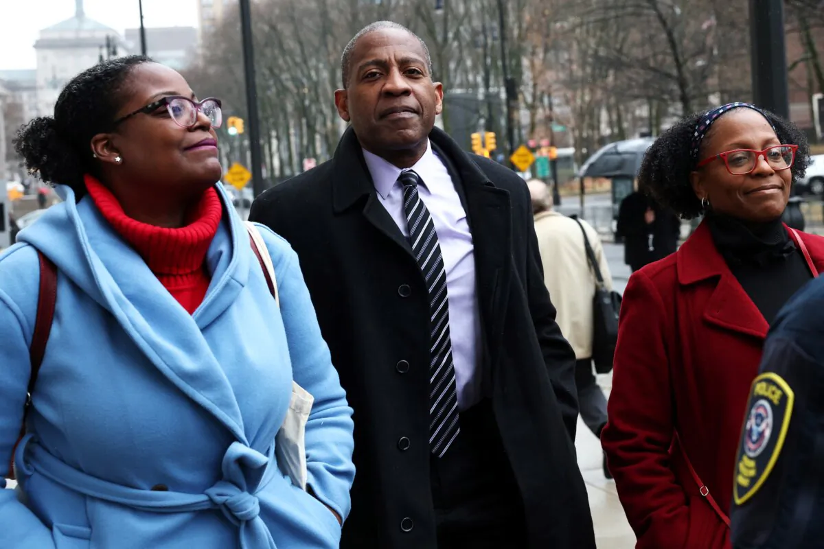 Carlos Watson (C) co-founder of Ozy Media, arrives for his sentencing hearing at Brooklyn Federal Court in New York City on Dec. 16, 2024. (Michael M. Santiago/Getty Images)