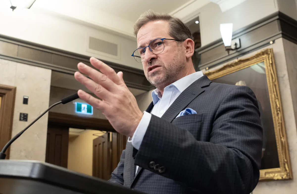 Bloc leader Yves-Francois Blanchet speaks with reporters in the Foyer of the House of Commons, in Ottawa, on Dec 17, 2024.  (The Canadian Press/Adrian Wyld)