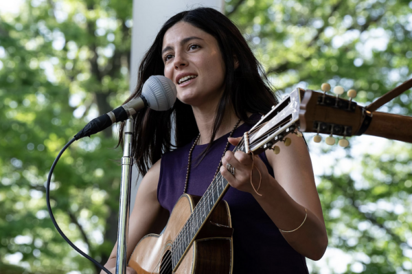 woman with guitar in A Complete Unknown