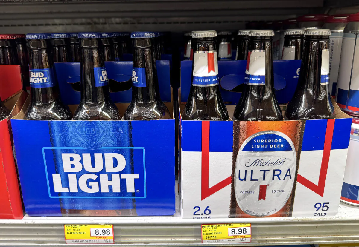 Six packs of Michelob Ultra and Bud Light are displayed at a grocery store in San Anselmo, Calif., on Dec. 16, 2024. (Justin Sullivan/Getty Images)