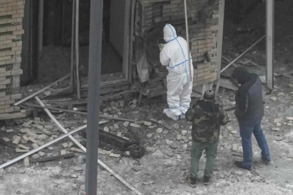 Investigators examine the scene where a bomb planted in a scooter (pictured, center) killed Lt. Gen. Igor Kirillov, in Moscow, Russia, on Dec. 17, 2024. (AP Photo)