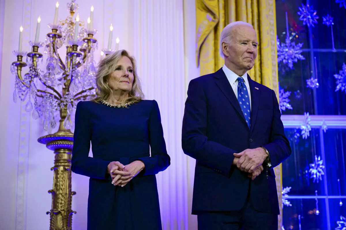 President Joe Biden and First Lady Jill Biden attend an event in the East Room of the White House on Dec. 16, 2024. (Jim Watson/AFP via Getty Images)