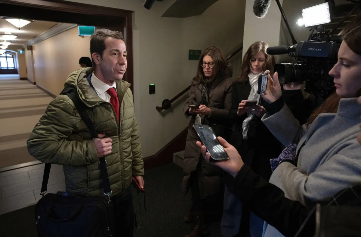 Quebec Liberal MP Anthony Housefather speaks with reporters as he makes his way to question period in Ottawa on March 19, 2024. (The Canadian Press/Adrian Wyld)