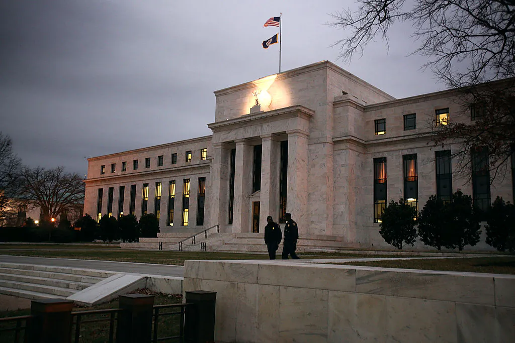 Flags fly over the Federal Reserve Board Building in Washington, in this file photo. (Mark Wilson/Getty Images)