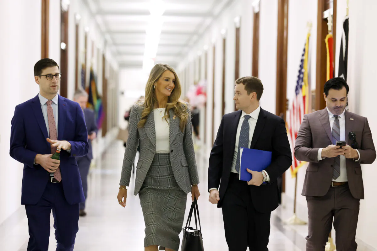 Former Sen. Kelly Loeffler (R-Ga.) (2nd L), President Donald Trump's nominee to be administrator of the Small Business Administration (SBA), walks through the Russell Senate Office Building in Washington on December 18, 2024. (Anna Moneymaker/Getty Images)