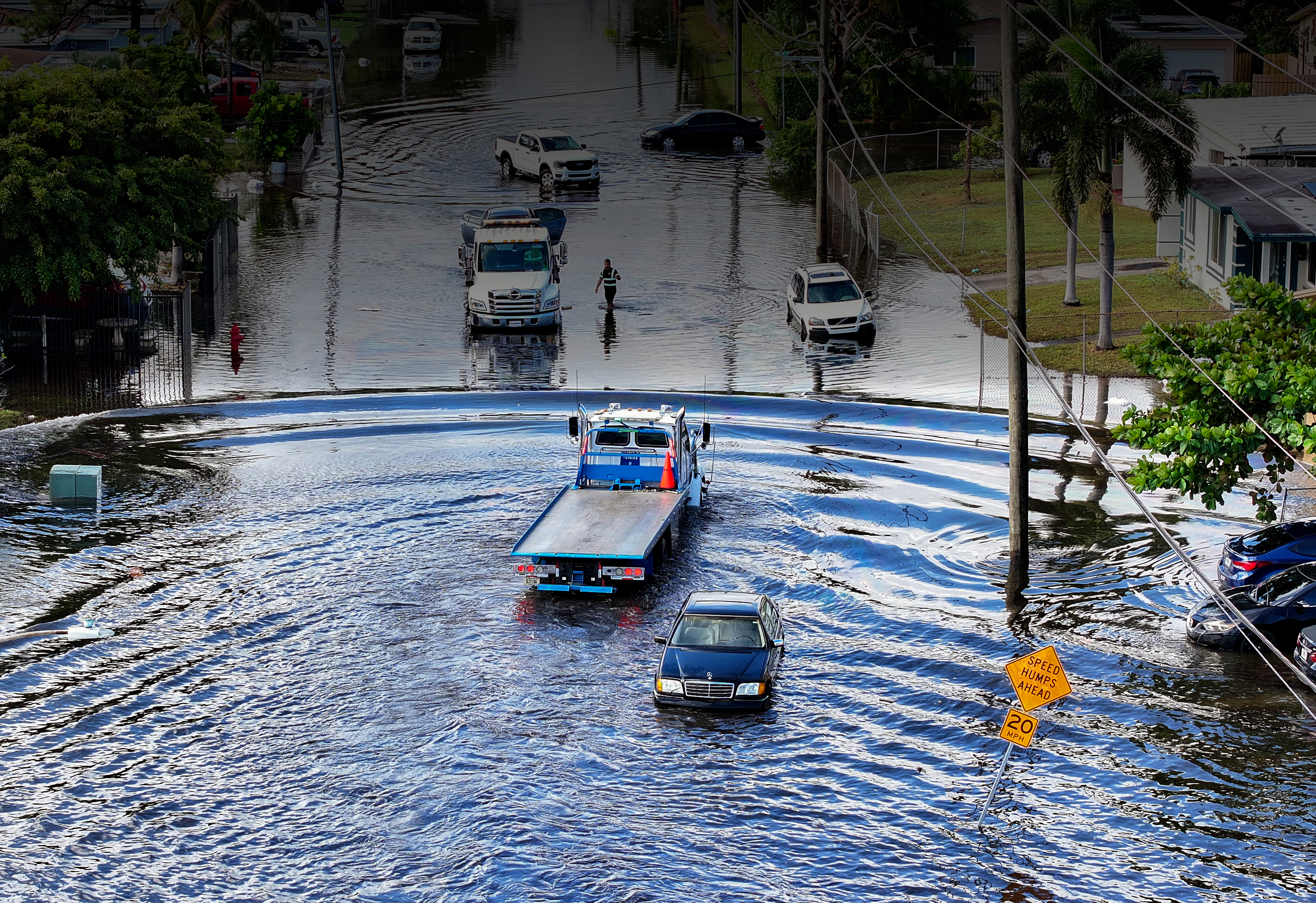 Day in Photos: Flooded Florida, Argentina Plane Crash, Concert at the Royal Palace