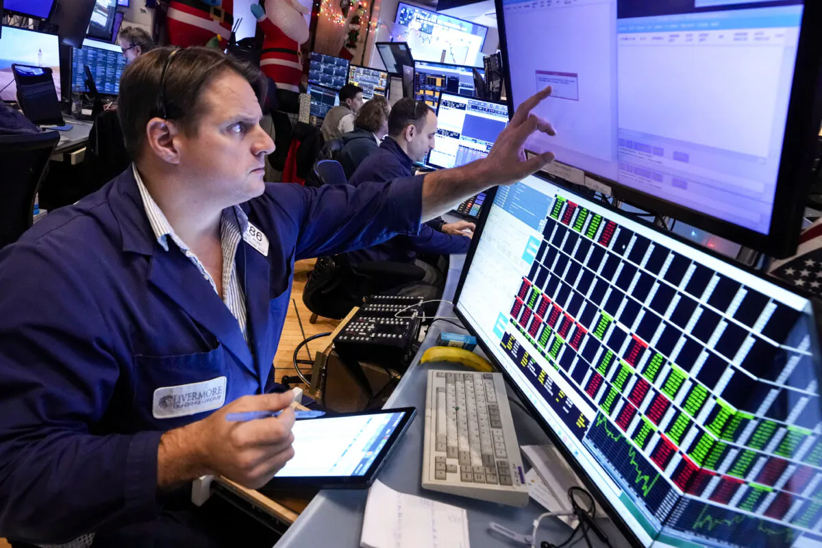 A trader works on the floor of the New York Stock Exchange in a file photo. (AP Photo/Richard Drew)