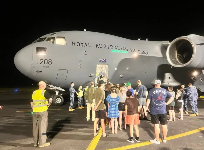 Australians board flights home from Vanuatu. (Courtesy of DFAT) 
