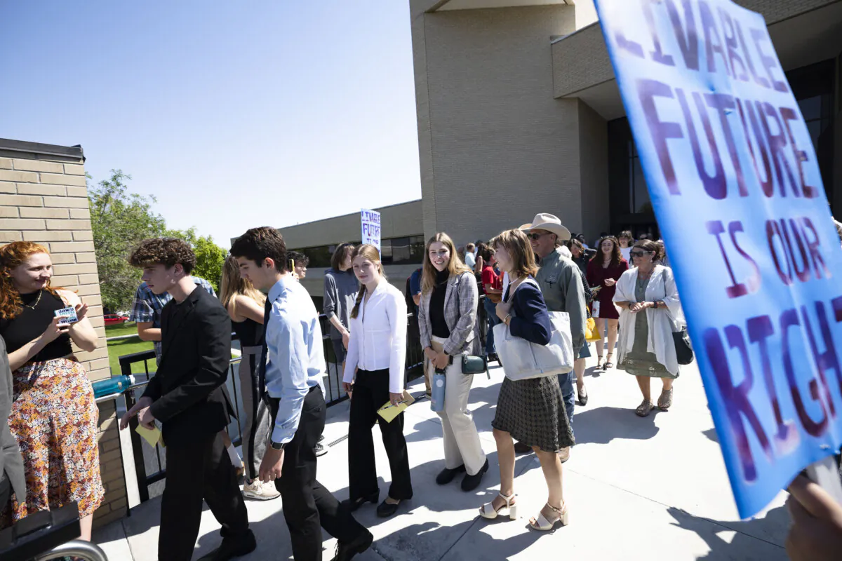 Plaintiffs in the Held v. Montana climate case leave the Montana Supreme Court in Helena, Mont., on July 10, 2024. (Thom Bridge/Independent Record via AP)
