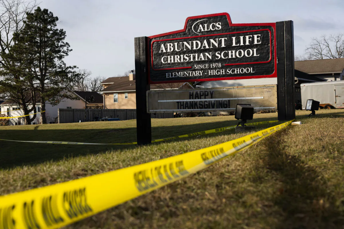 Crime scene tape continues to be stretched around Abundant Life Christian School as police continue to investigate yesterday's shooting in Madison, Wis., on Dec. 17, 2024. Multiple people were shot and at least three have died after a teenage girl, who was a student at the school, opened fire inside the school. (Scott Olson/Getty Images)